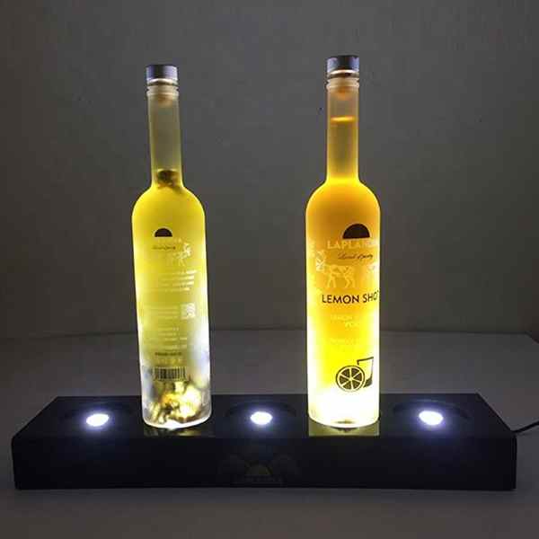https://www.popai-global.com/wp-content/uploads/2021/03/5-Bottles-Led-Light-Bottle-Glorifier-1.jpg